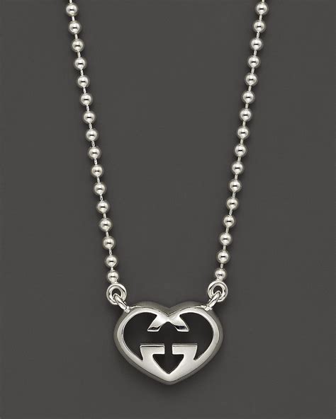 gucci sterling silver heart necklace.